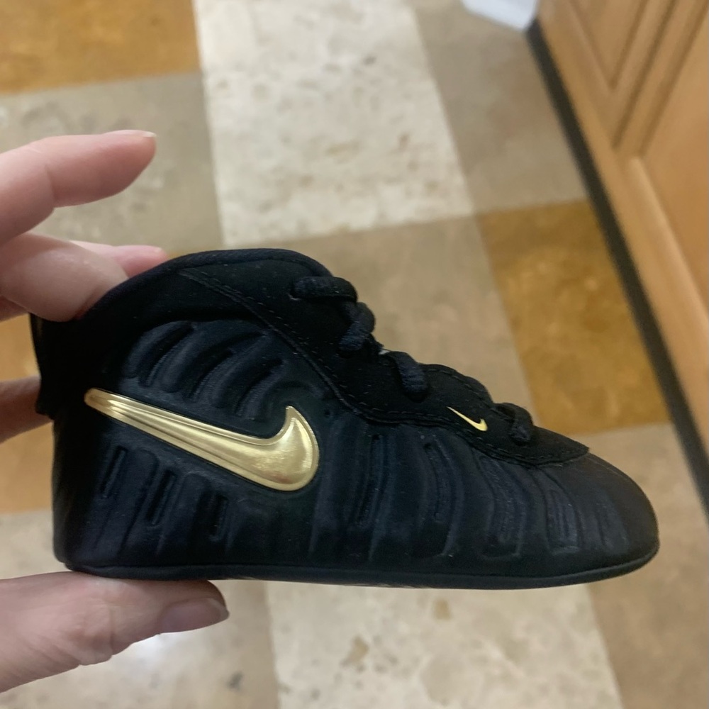 Nike Kids Black and Gold Shoes